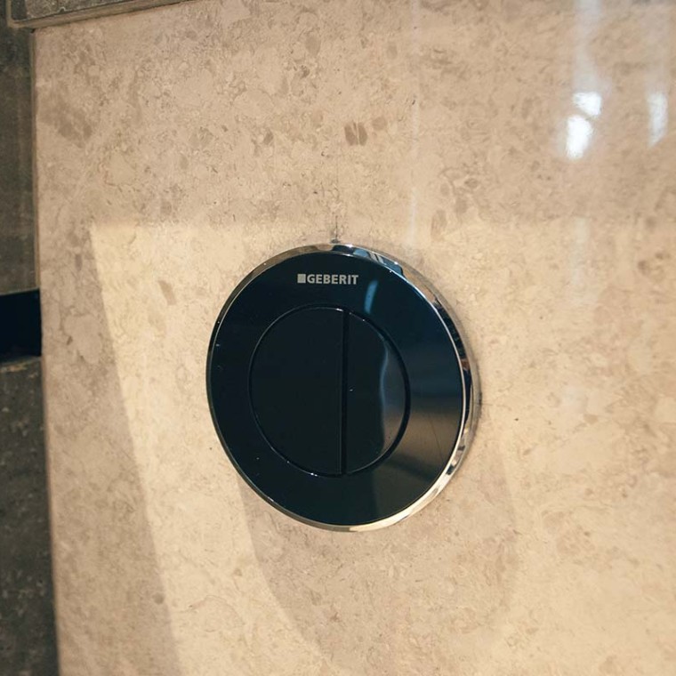 Geberit Type 10 pneumatic flush button at The Reef at King's Dock