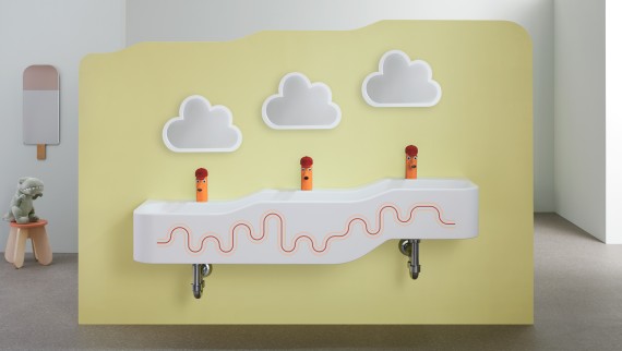 Geberit Bambini play and washspace in carmine red and orange Geberit Bambini play and washspace in carmine red and orange