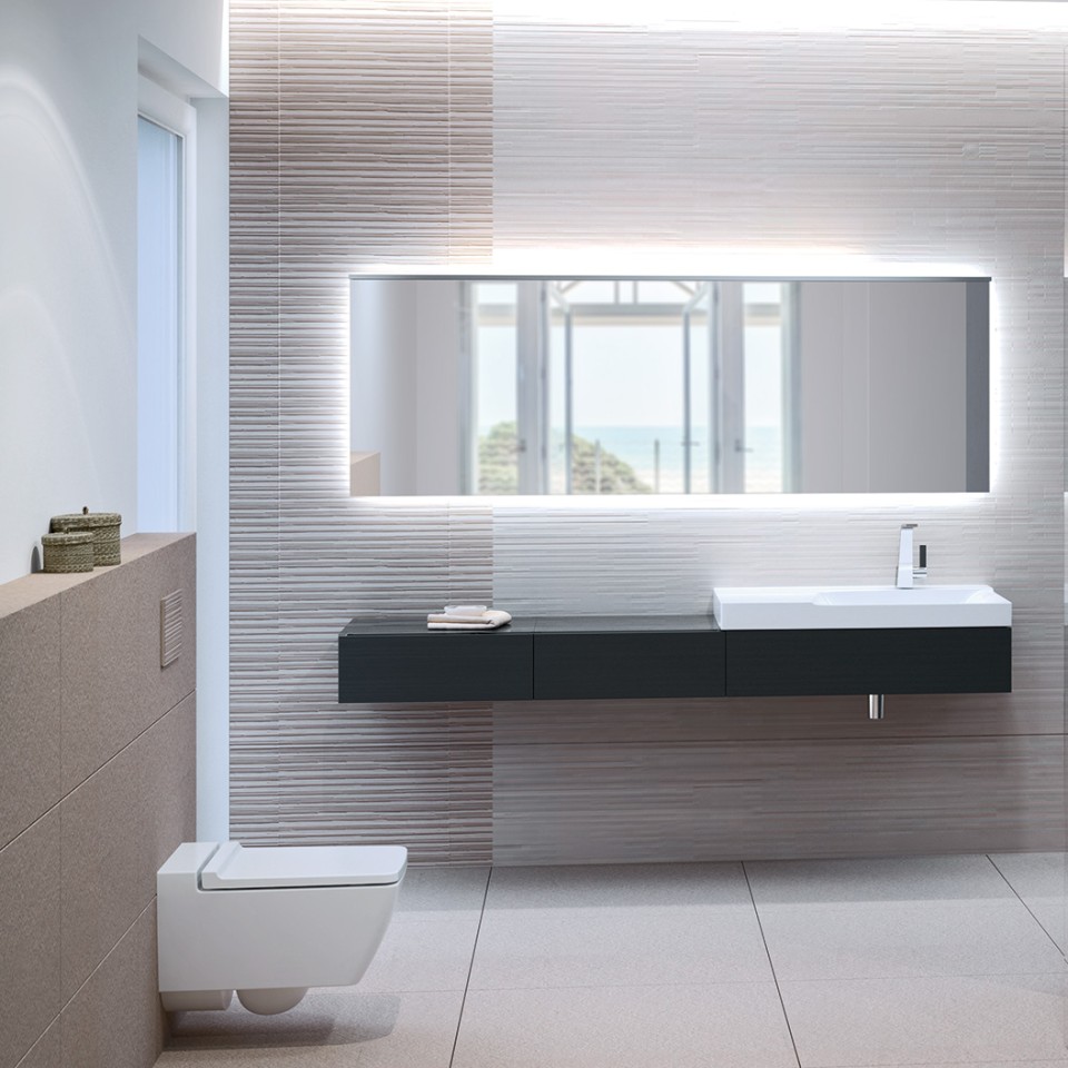 Bathroom with Geberit Xeno² toilet rimfree, actuatorplate Sigma70 and washbasin