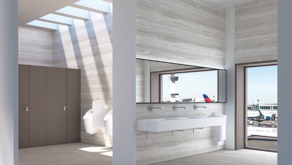 Bathroom equipped with the Geberit Brenta wall mounted tap system in a public area