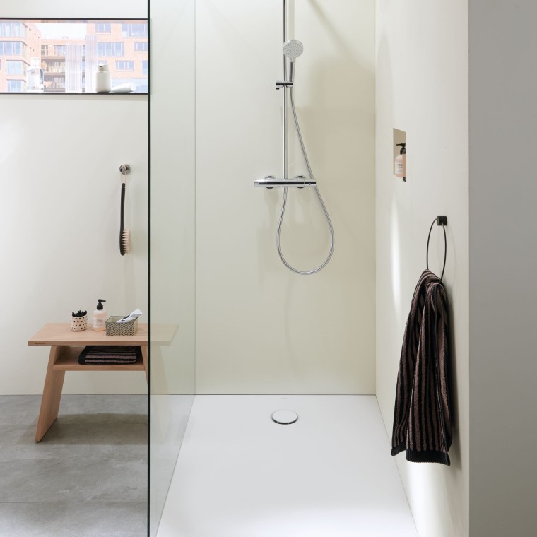 A walk-in shower in a small bathroom A walk-in shower in a small bathroom