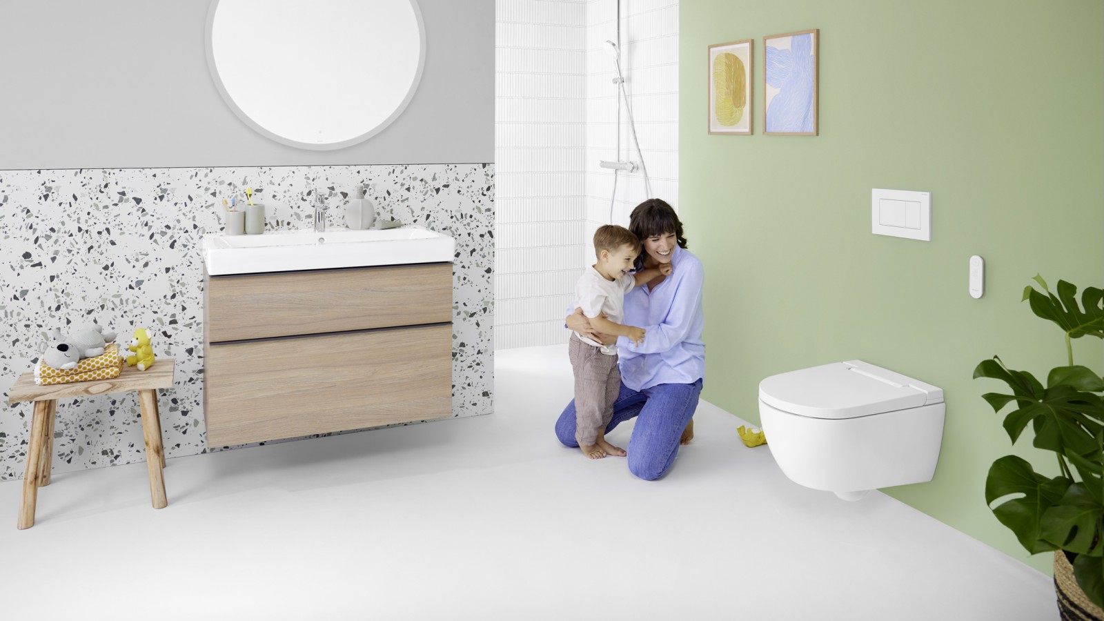 Woman and child in Geberit bathroom