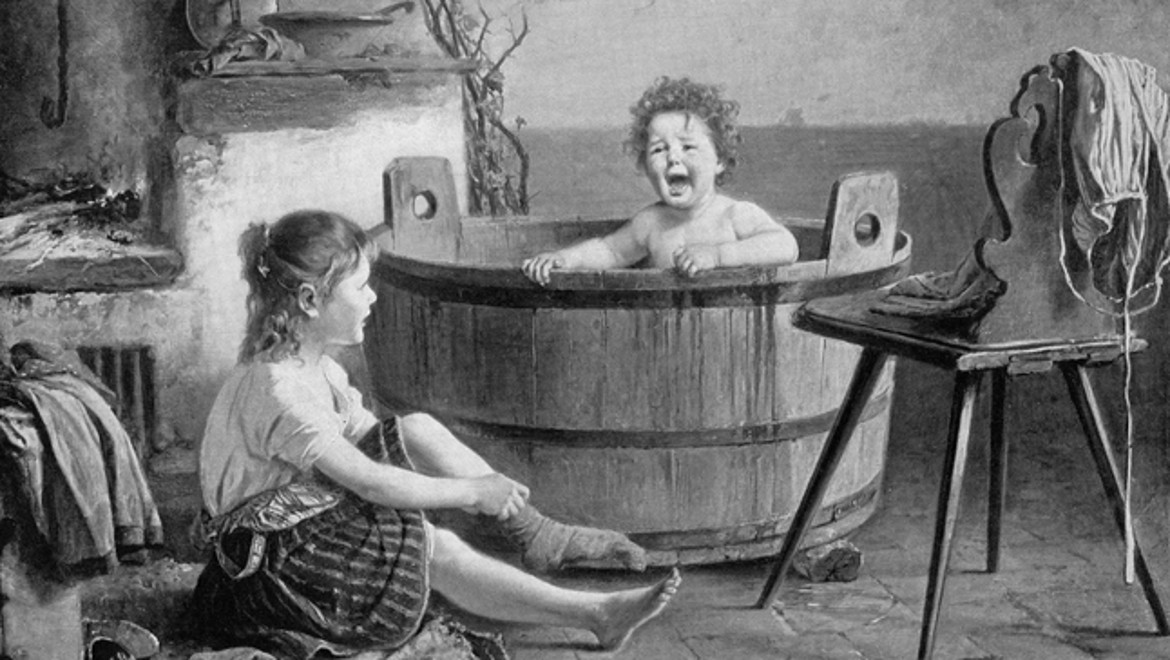 Child bathes in washtub