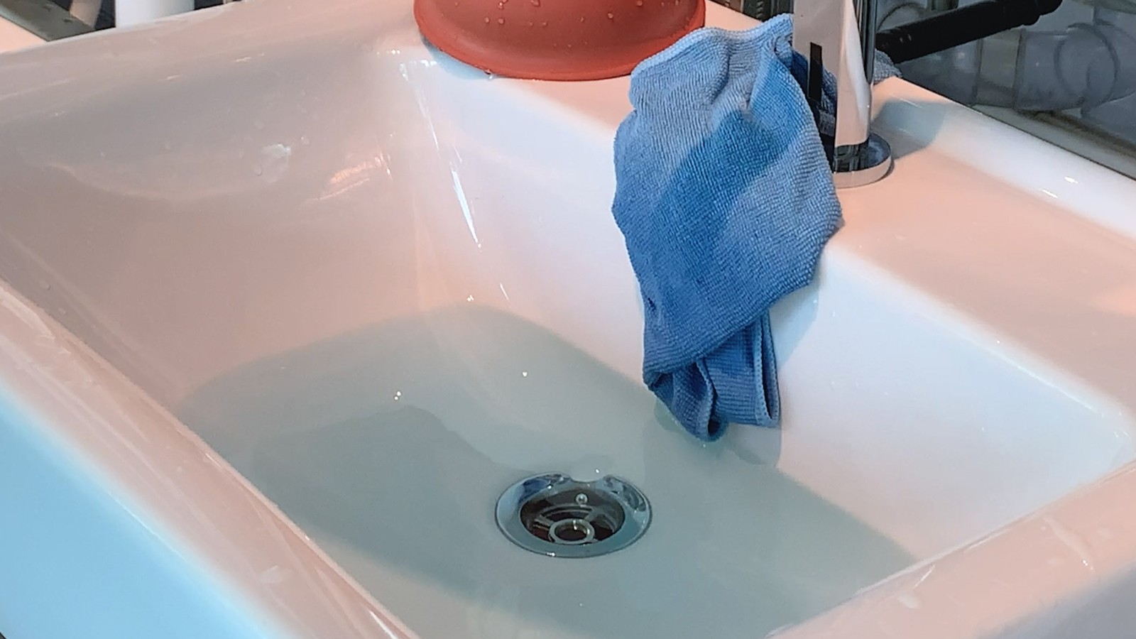 The water drains out of the washbasin