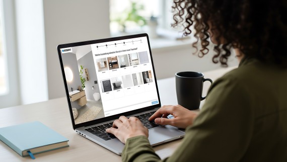 Woman using the Budget Calculator for a bathroom from Geberit Woman using the Budget Calculator for a bathroom from Geberit