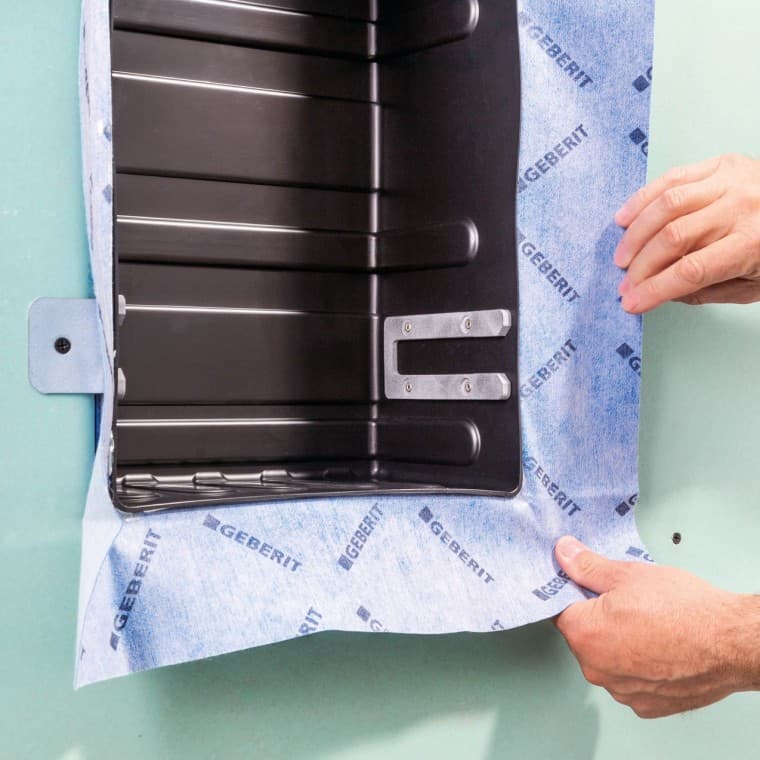 An installation set with a premounted sealing foil makes the niche storage box an integral component of the installation system An installation set with a premounted sealing foil makes the niche storage box an integral component of the installation system