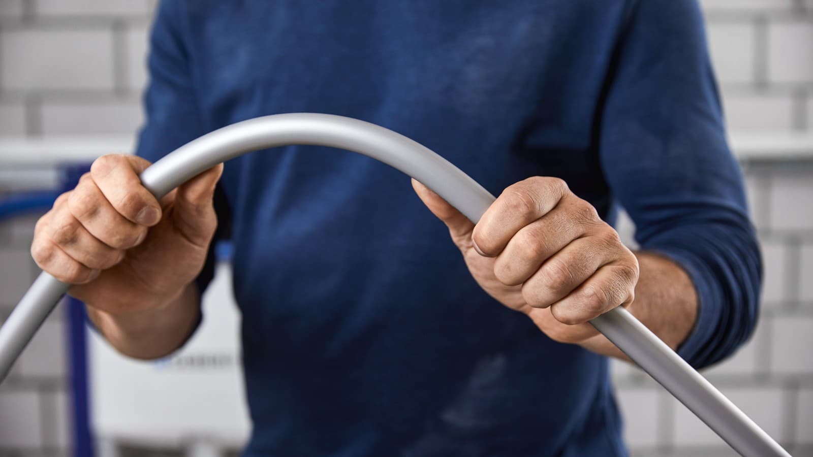 Bending Geberit FlowFit pipes by hand